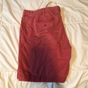 Red/pale red/ dark salmon polo shorts.